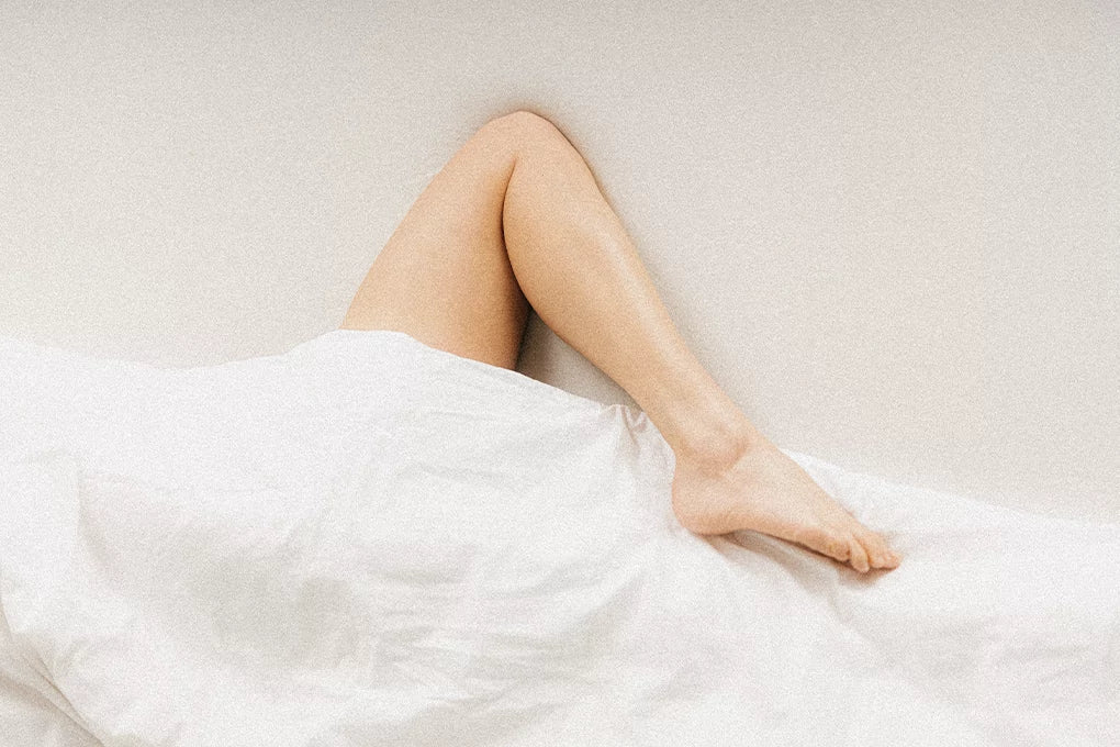 A bare leg stick out from under the covers. What are the Best terpenes for sex?