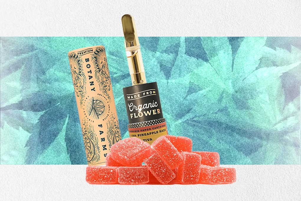 A Botany Farms Organic Flower Cannabis vapor cartridge with pineapple haze flavor and some red gummies are placed on a white surface against a bluish background