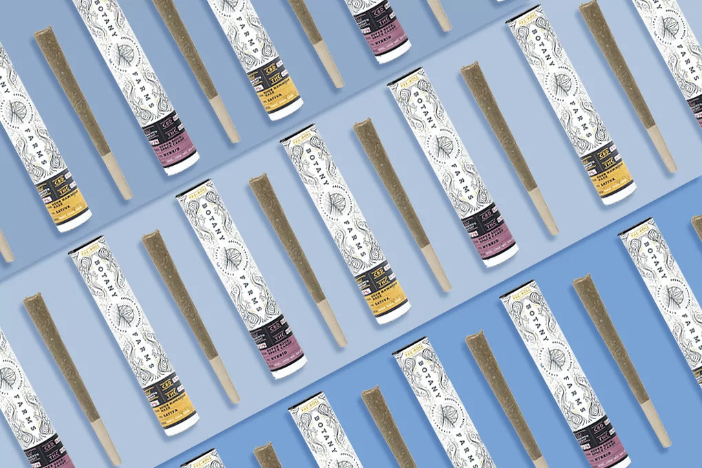 Three diagonal rows of Botany farms pre-roll joints are displayed against a blue background.