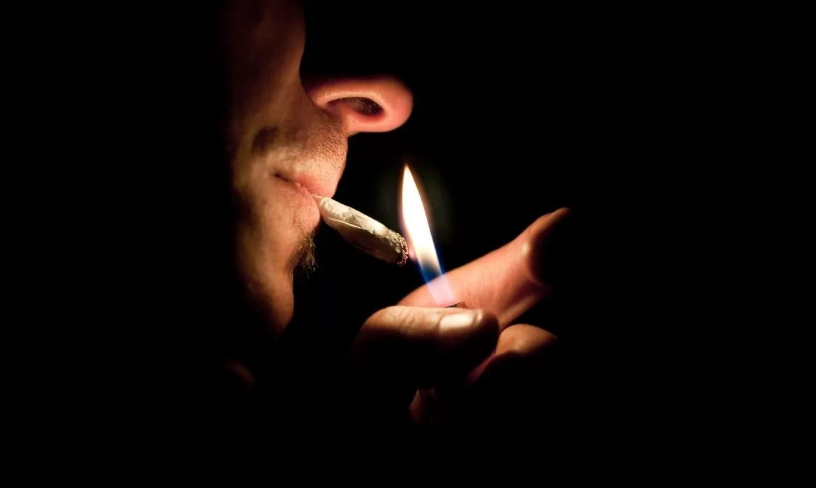 Man smoking delta-8 THC