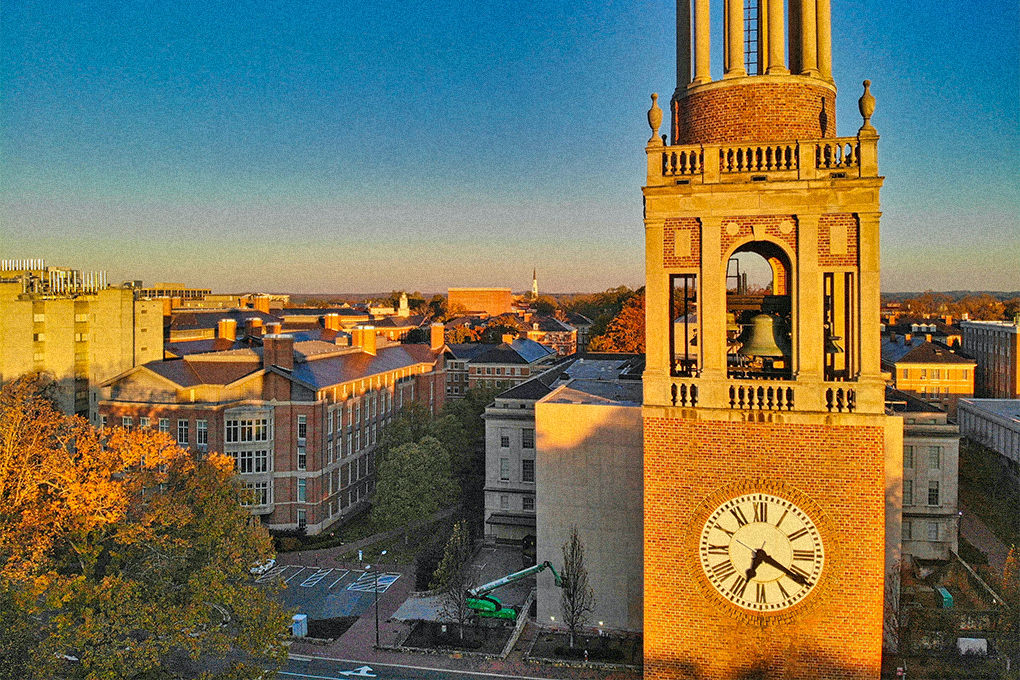 Aerial view of the Morehead-Patterson Bell Tower in North Carolina surrounded by other buildings, captured during daylight