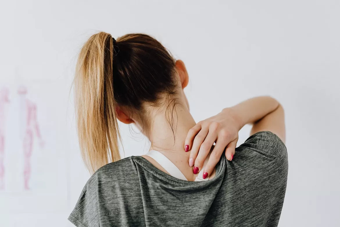 A woman with neck pain