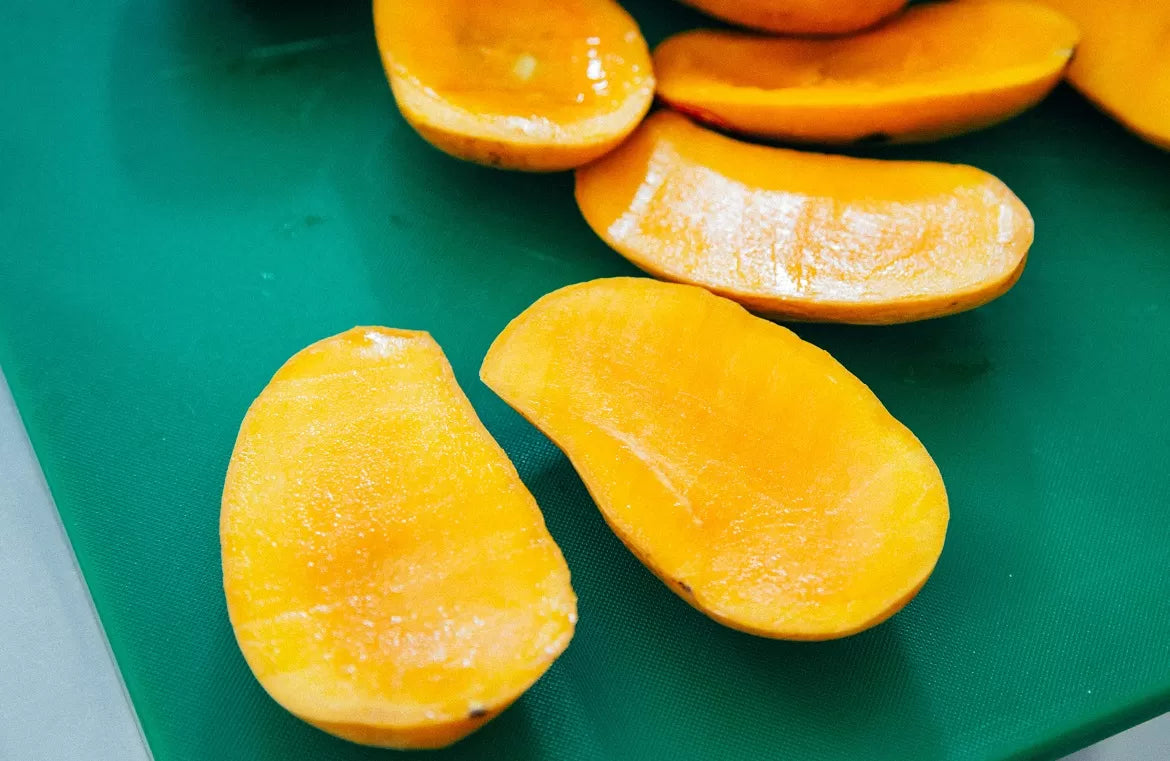 Sliced mangos full of myrcene on a cutting board