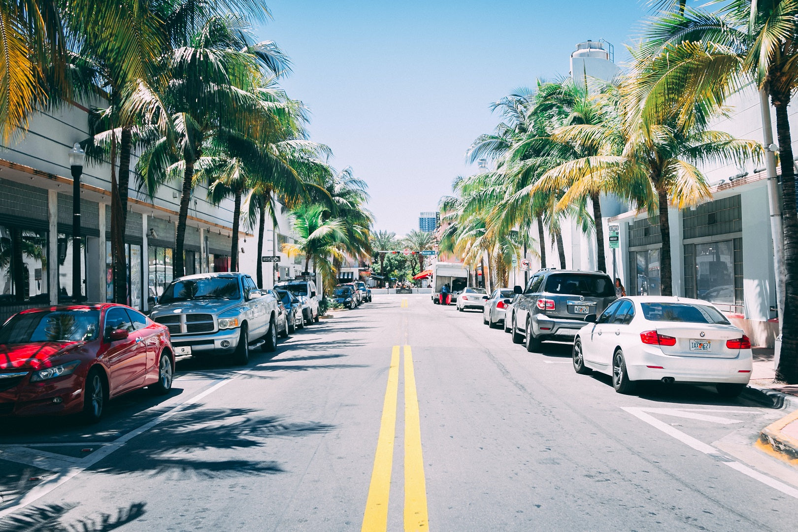 A shot of cars parked on a street in Miami Beach
